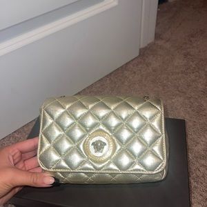 Gold Versace handbag